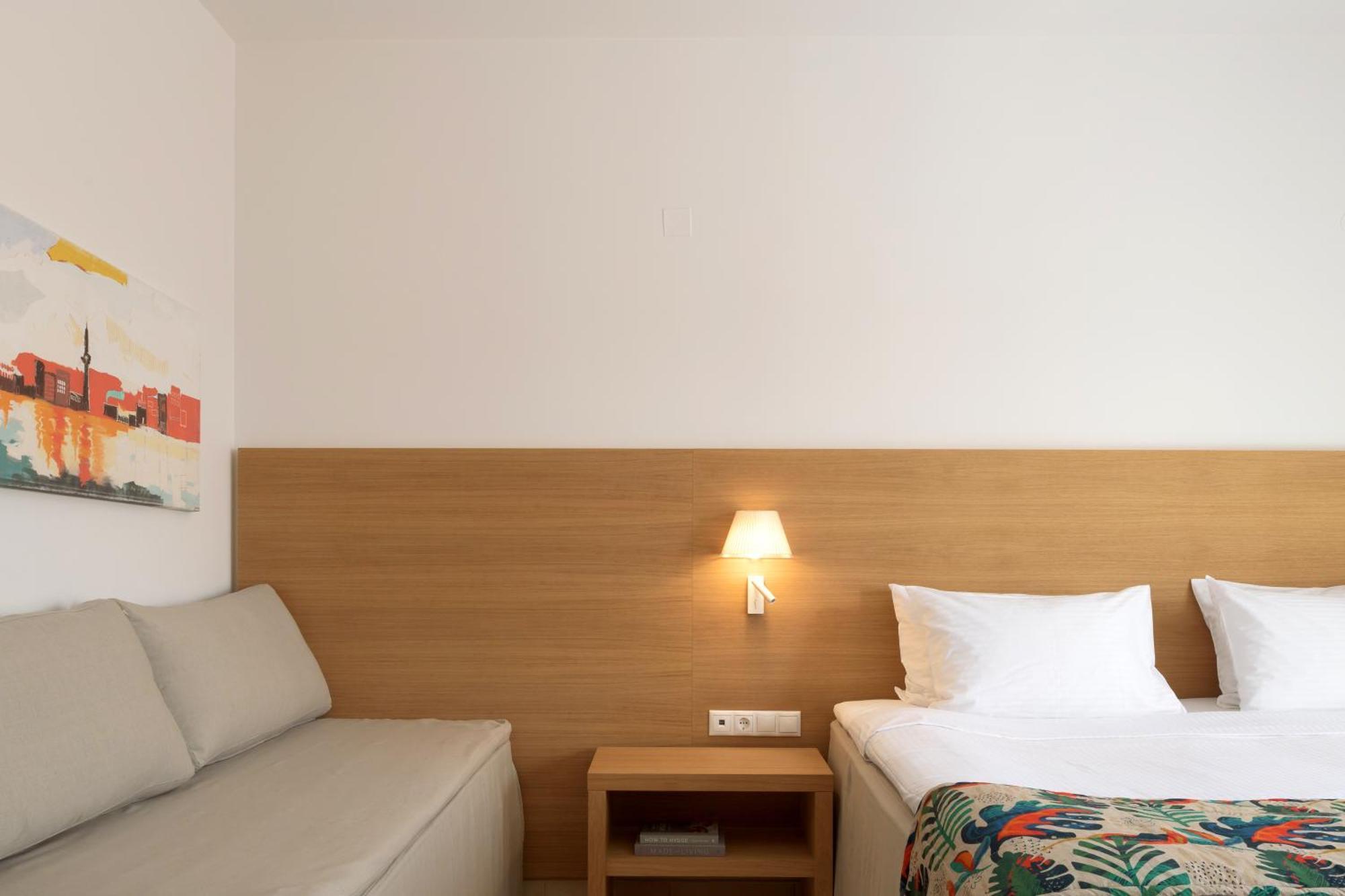Chambre Double Deluxe - Vue Latérale sur Mer